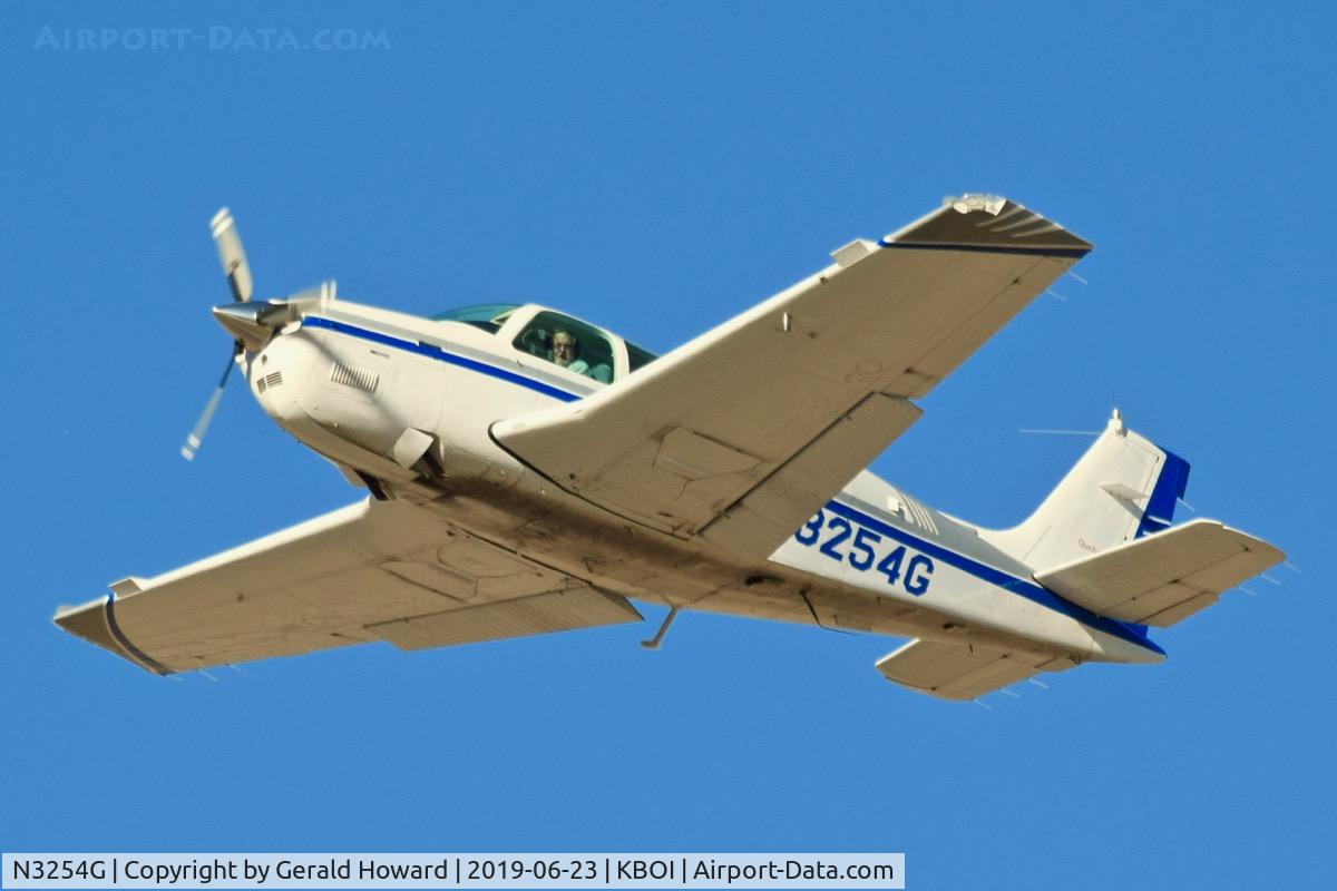 N3254G, 1995 Beech A36 Bonanza 36 C/N E-2954, Departing BOI.