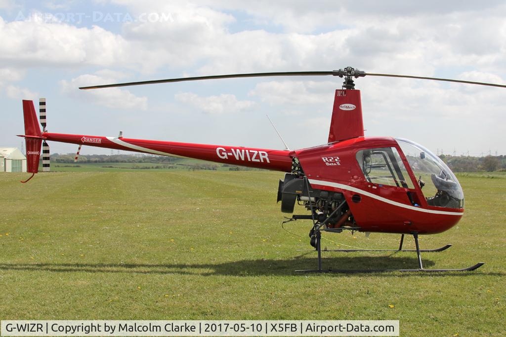 G-WIZR, 1998 Robinson R22 Beta II C/N 2799, Robinson R22 Beta II at Fishburn Airfield, UK.