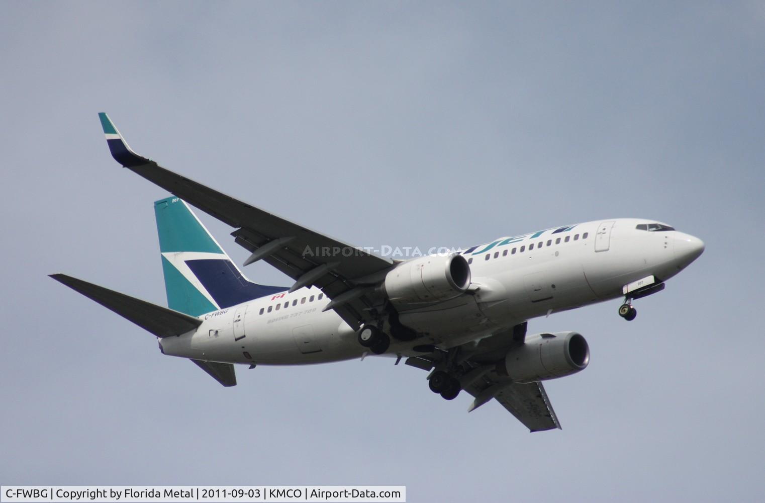 C-FWBG, 2003 Boeing 737-7CT C/N 32749, MCO spotting