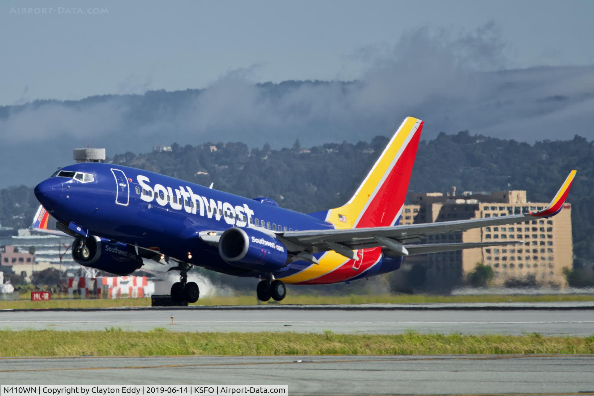 N410WN, 2001 Boeing 737-7H4 C/N 27897, Departing runway 01 SFO 2019.