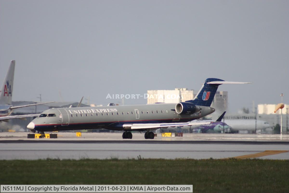 N511MJ, 2003 Bombardier CRJ-700 (CL-600-2C10) Regional Jet C/N 10104, MIA spotting