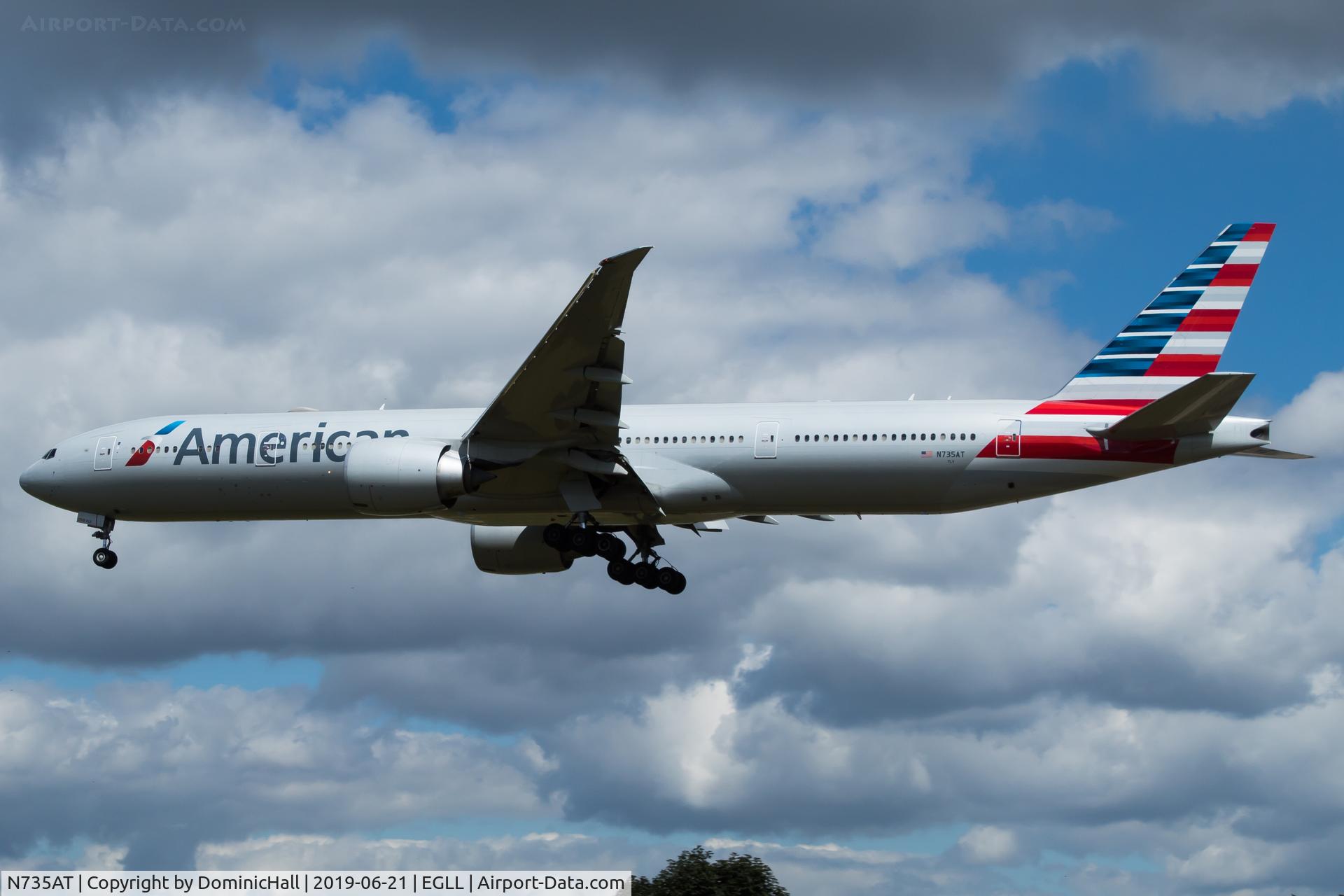 N735AT, 2016 Boeing 777-323/ER C/N 32439, Landing RWY 27L
