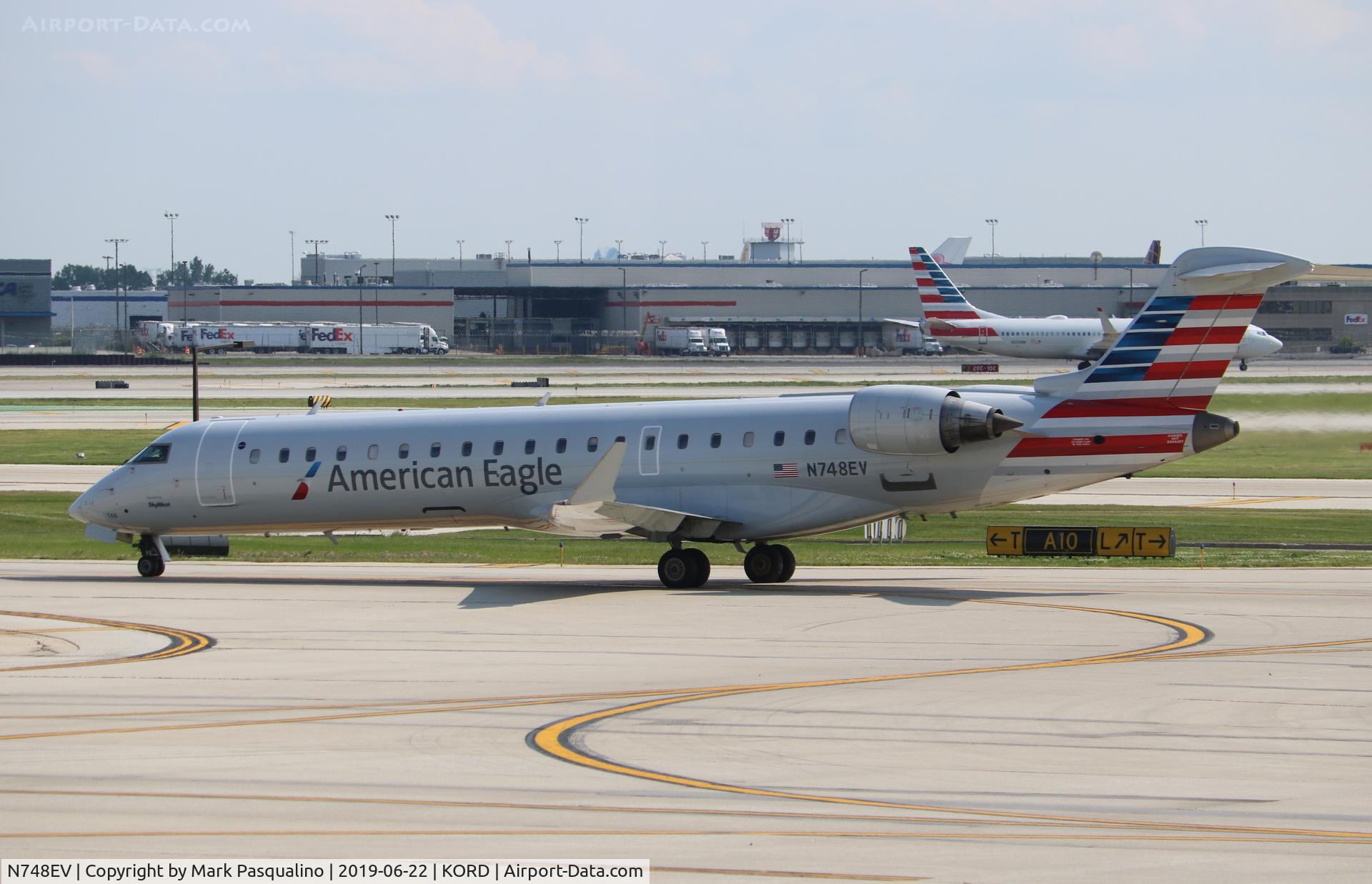 N748EV, 2004 Bombardier CRJ-700 (CL-600-2C10) Regional Jet C/N 10158, CL-600-2C10