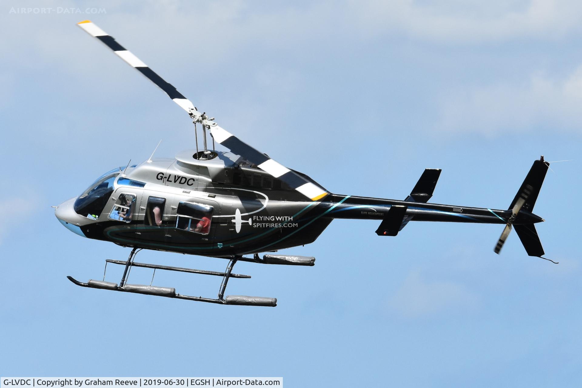 G-LVDC, 1989 Bell 206L-3 LongRanger III C/N 51300, Departing from Norwich.