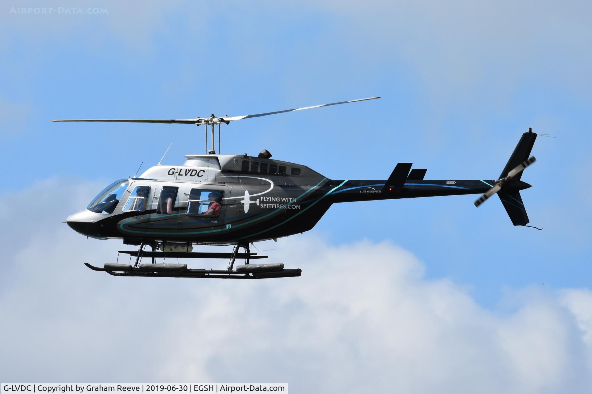 G-LVDC, 1989 Bell 206L-3 LongRanger III C/N 51300, Departing from Norwich.