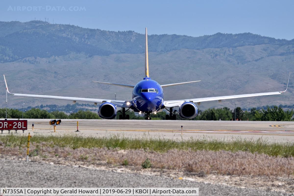 N735SA, 1999 Boeing 737-7H4 C/N 27867, On taxiway Juliet for RWY 10R.