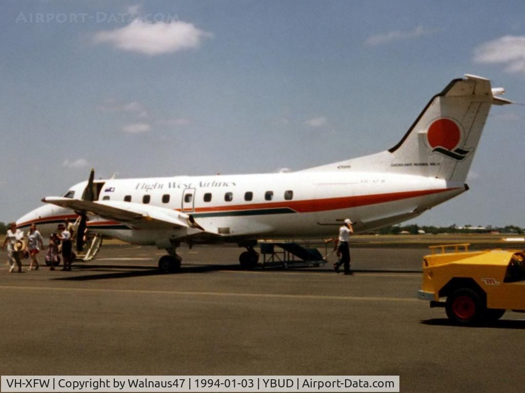 VH-XFW, 1990 Embraer EMB-120ER Brasilia C/N 120181, Low res rear Port side view of Flight West EMB120RT Brasilia VH-XFW (Cn 120181), shown in original Flight West livery, at Bundaberg Airport YBUD on 03Jan1994. Photo taken before a 0.7 hour flight to Brisbane in this aircraft. 