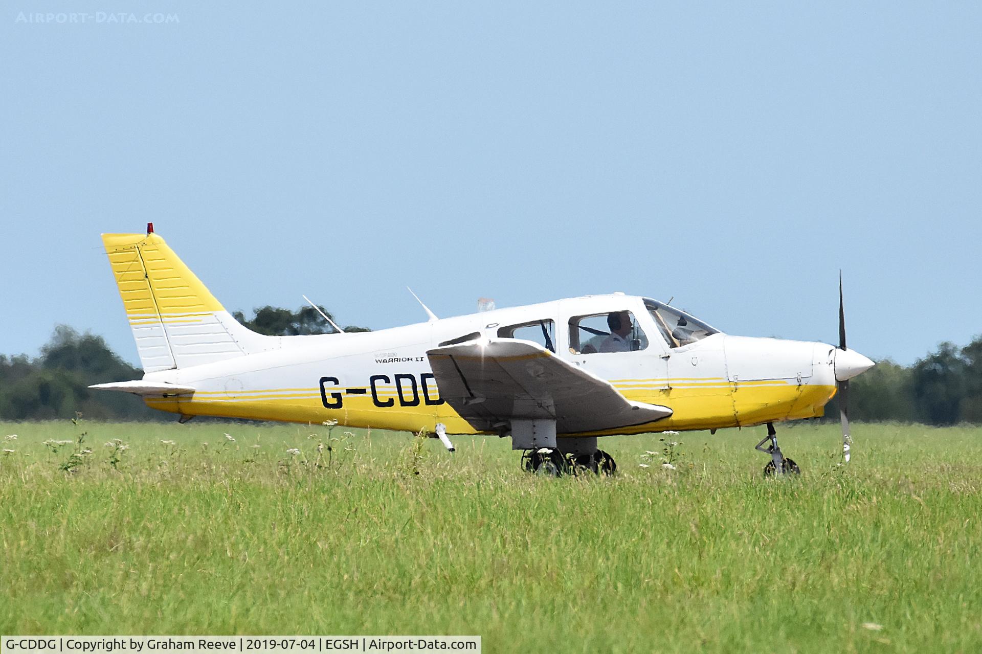 G-CDDG, 1988 Piper PA-28-161 Cherokee Warrior II C/N 2816065, Just landed at Norwich.