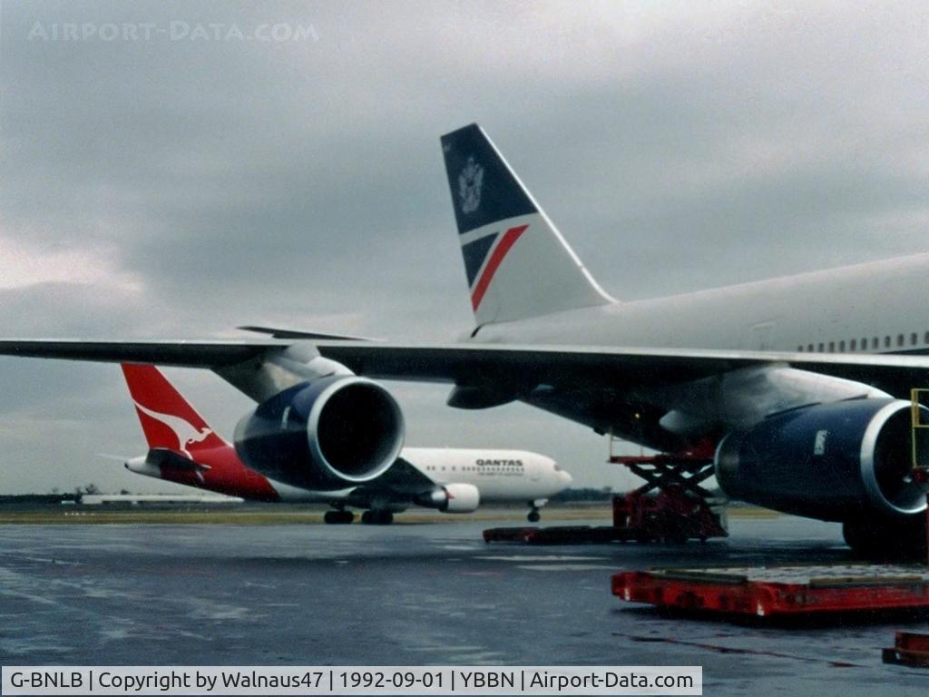 G-BNLB, 1989 Boeing 747-436 C/N 23909, View of the Stbd wing, Rolls Royce engines and tail of British Airways B747-436 G-BNLB (Cn 23909, Named 'City of Edinburgh') at the 'Old Eagle Farm' International Airport YBBN on 01Sep1992. A Qantas B767-238 is taxying at rear.