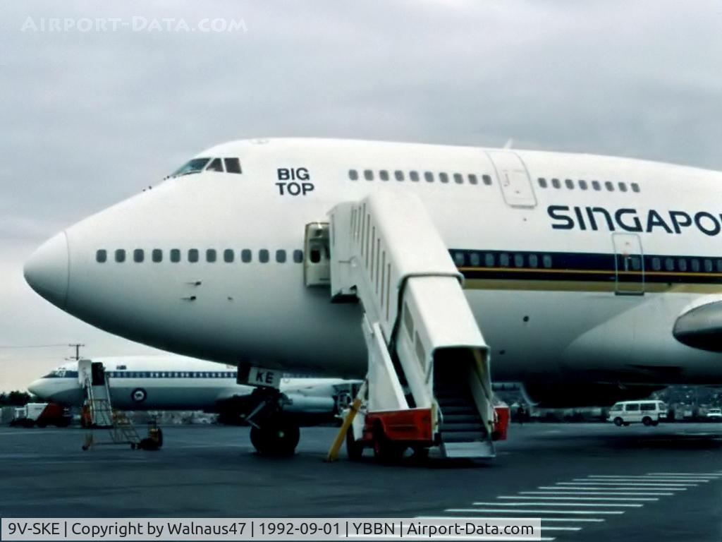 9V-SKE, 1984 Boeing 747-312 C/N 23030, Forward fuselage of Singapore Airlines B747-312 9V-SKE (Cn 23030, ex N119KE) at the 'Old Eagle Farm' International Airport YBBN on 01Sep1992. This aircraft is now better known as Corsair F-GSUN. Photo taken before flying to Stansted in RAAF B707 A20-624.