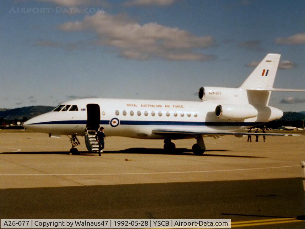 A26-077, 1989 Dassault Falcon 900B C/N 077, Low res RAAF 34 Squadron Falcon 900 A26-077 Cn 077 on the apron at RAAF Base Fairbairn YSCB on 28May1992. The aircraft had just returned from a round trip to Sydney. Flight time was 0.4 hours. The F900 delivered a Flight Crew to  Hawker Pacific Sydney.
