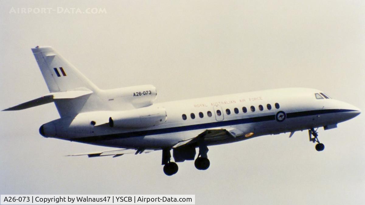 A26-073, 1989 Dassault Falcon 900 C/N 073, Low res rear Stbd view of RAAF 34 Squadron VIP Falcon 900 A26-073 Cn 073 taking off from Canberra's Rwy 35 during 1999. This was one of five F900s then being operated as 'Special Purpose Aircraft' by 34 Squadron. The aircraft wheels are still extended.