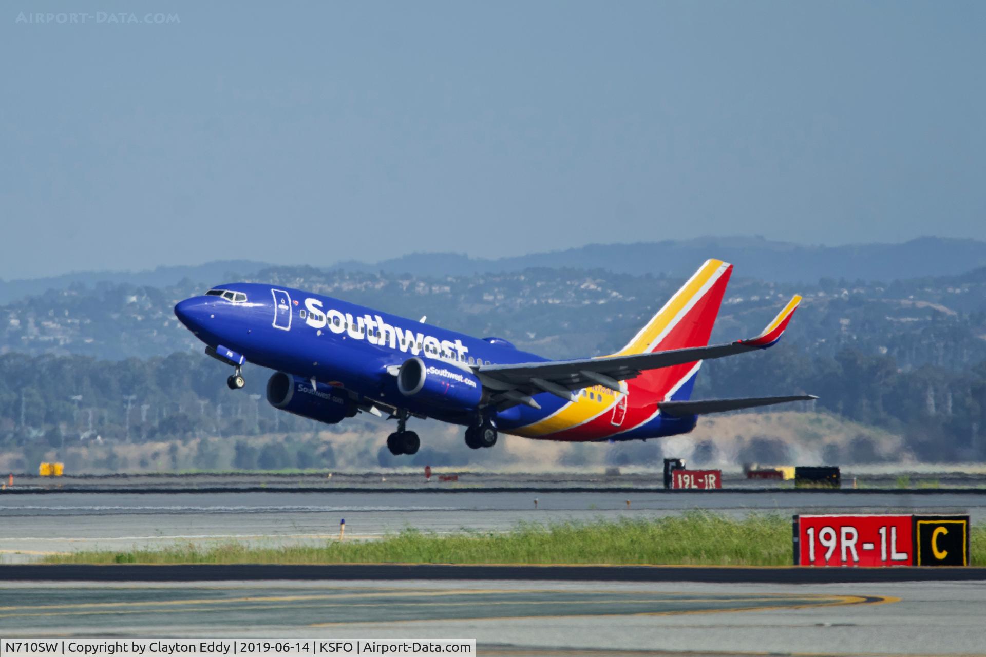 N710SW, 1998 Boeing 737-7H4 C/N 27844, Departing runway 01 SFO 2019.