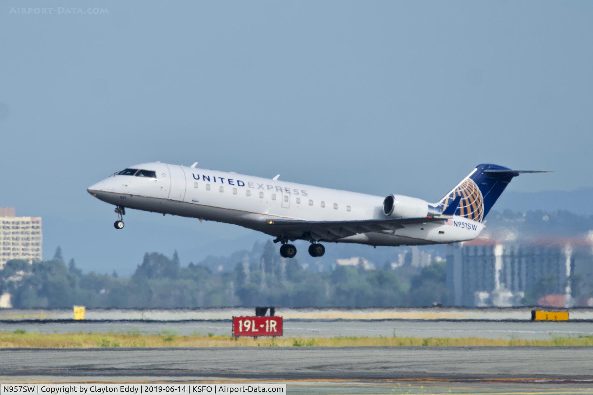 N957SW, 2003 Bombardier CRJ-200LR (CL-600-2B19) C/N 7829, Departing runway 01 SFO 2019.