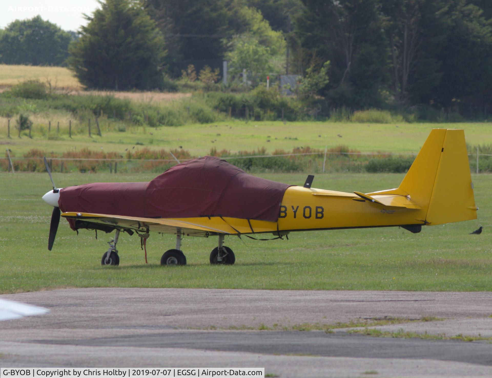 G-BYOB, 1999 Slingsby T-67M-260 Firefly C/N 2263, Parked and covered at its base Stapleford Tawney, Essex