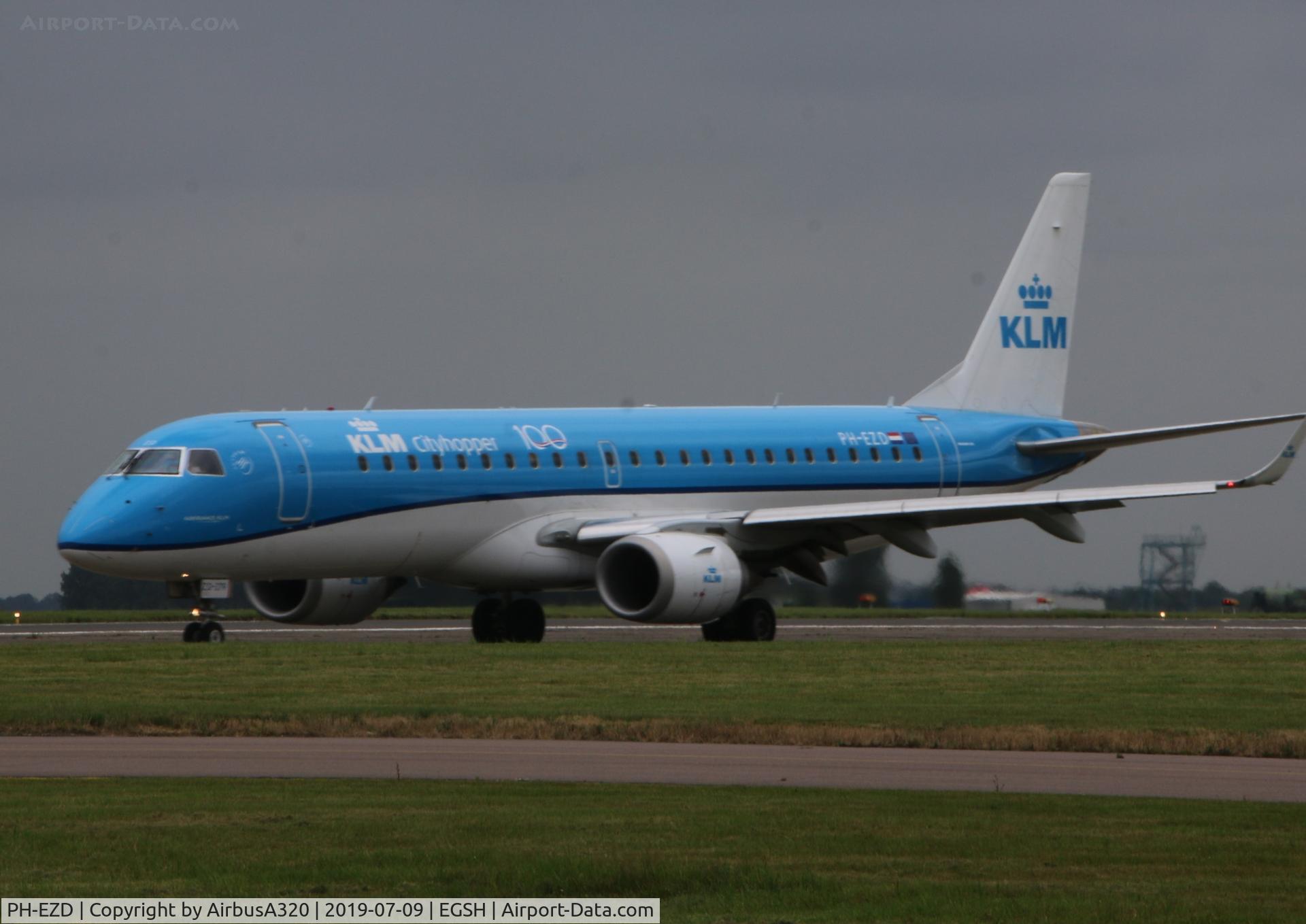PH-EZD, 2009 Embraer 190LR (ERJ-190-100LR) C/N 19000279, 100th Anniversary titles departing Norwich Airport