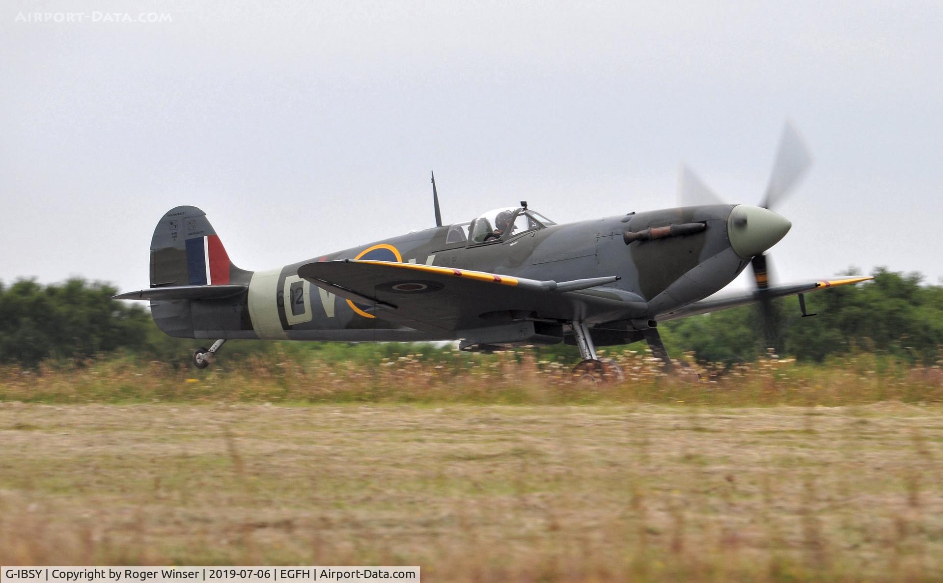 G-IBSY, 1942 Supermarine 349 Spitfire Vc C/N EE602, Spitfire marked EE602/DV-V departing Runway 04.