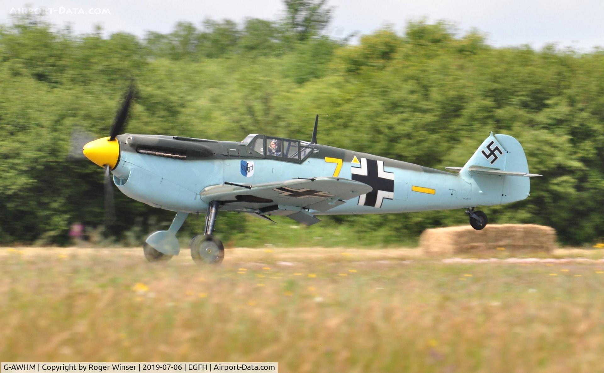 G-AWHM, 1958 Hispano HA-1112-M1L Buchon C/N 187, Buchon Yellow 7 - departing Runway 22.