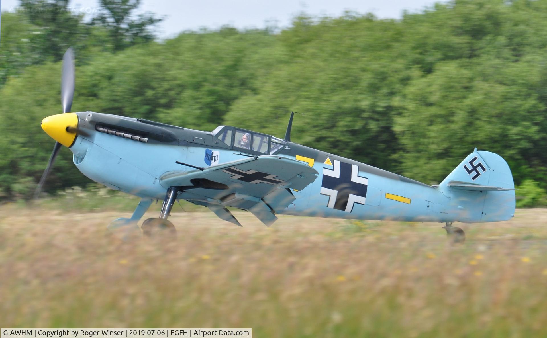 G-AWHM, 1958 Hispano HA-1112-M1L Buchon C/N 187, Buchon Yellow 7 - arriving Runway 22.