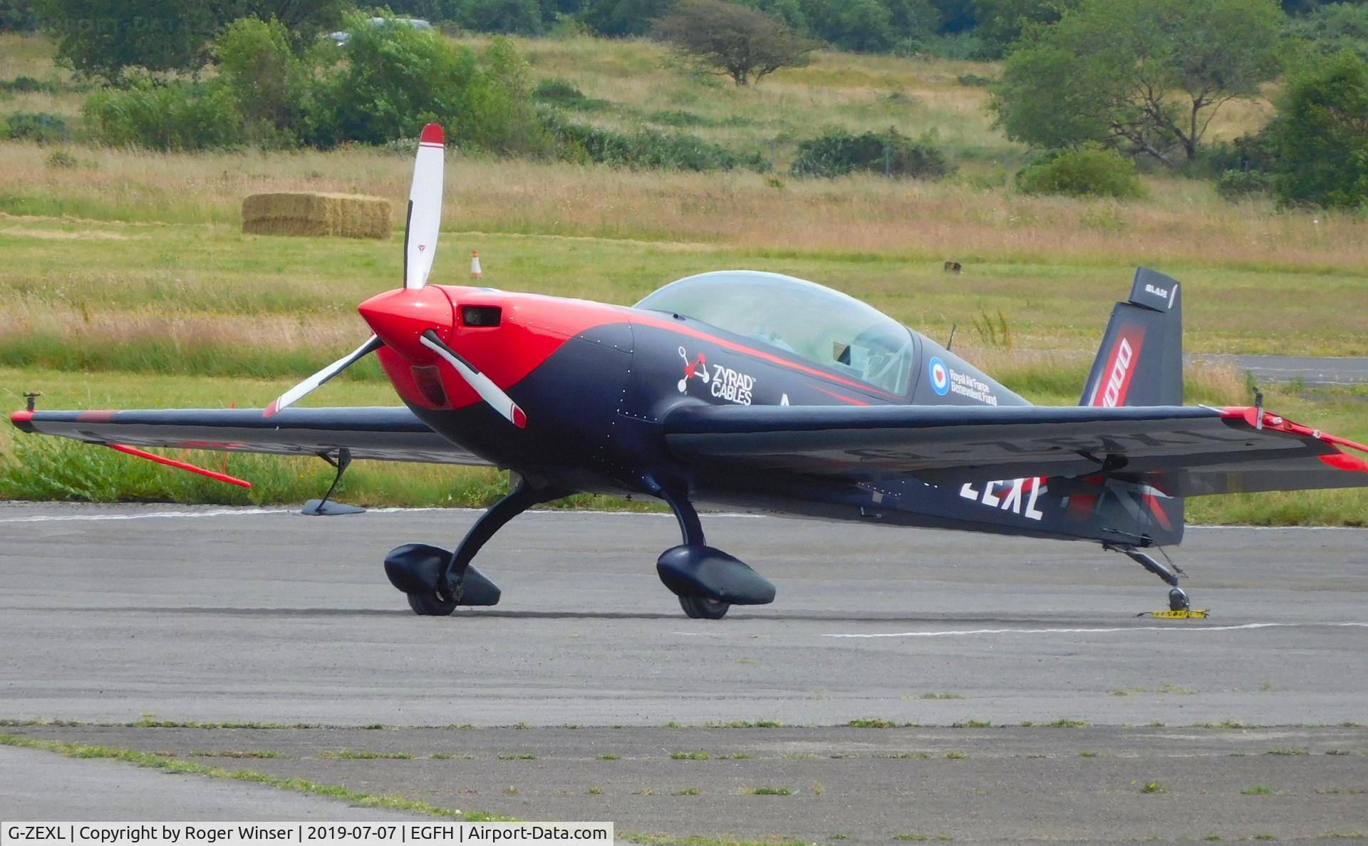 G-ZEXL, 2006 Extra EA-300L C/N 1225, EA-300L of the Blades aerobatic team after displaying on day 2 of WAS2019. Flown by a former RAF Red Arrows pilot.