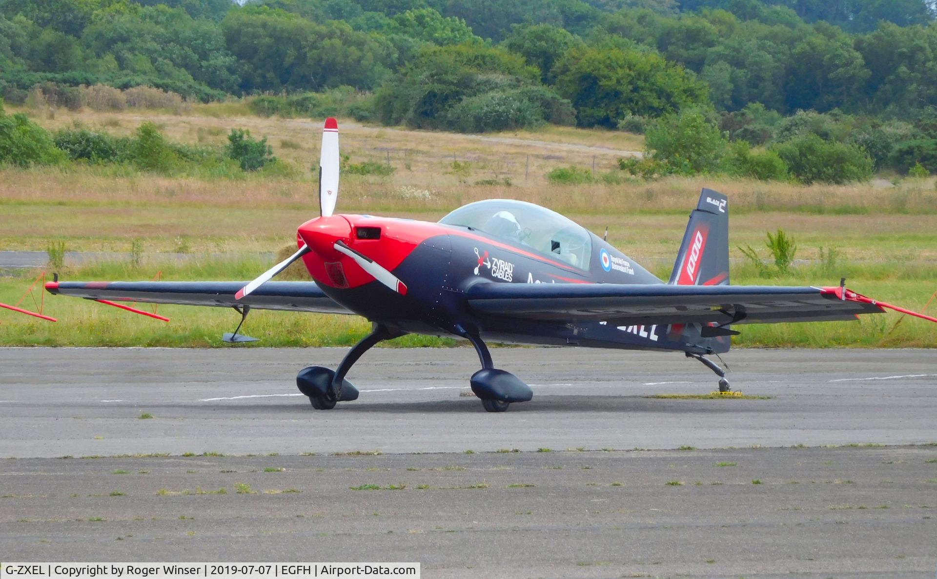 G-ZXEL, 2006 Extra EA-300L C/N 1224, EA-300L of the Blades aerobatic team after displaying on day 2 of WAS2019. Flown by a former RAF Red Arrows pilot.