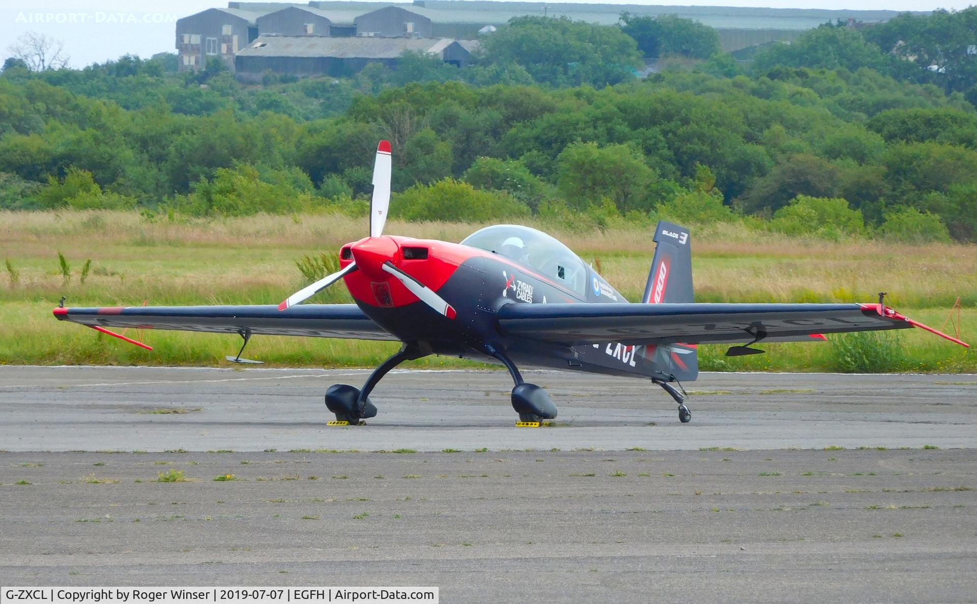 G-ZXCL, 2006 Extra EA-300L C/N 1223, EA-300L of the Blades aerobatic team after displaying on day 2 of WAS2019. Flown by a former RAF Red Arrows pilot.