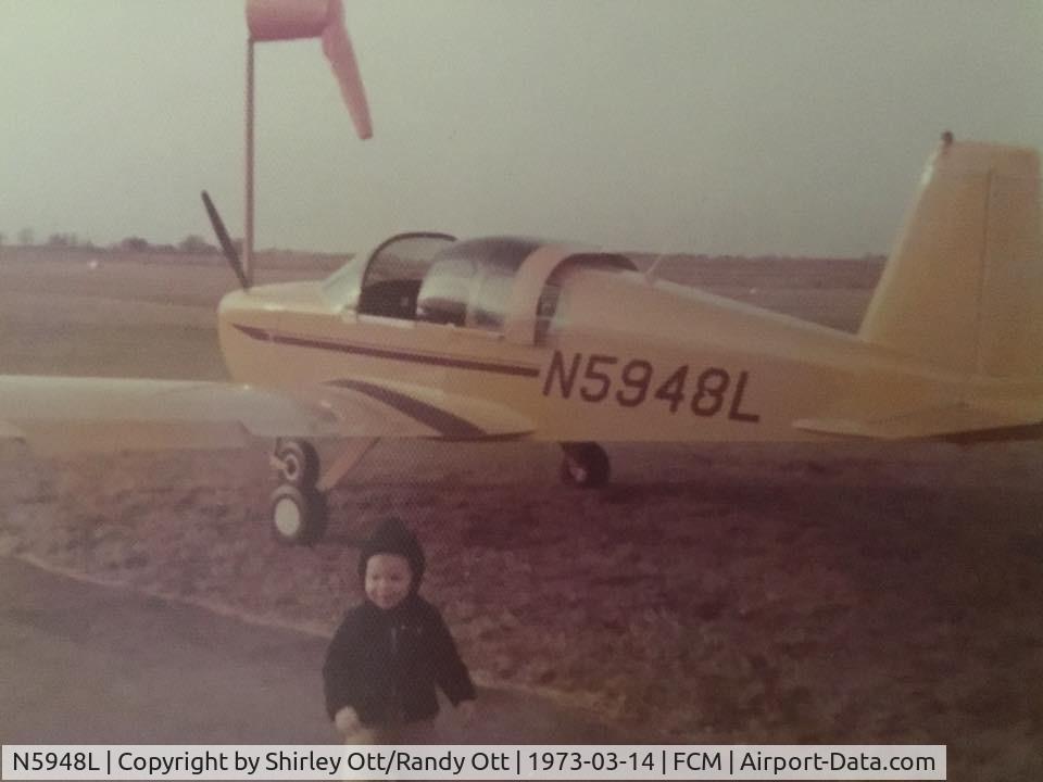 N5948L, 1969 American AA-1 Yankee C/N AA1-0248, Taken 1973 when the kid in the picture was 3-4 years old....now a Pilot for United Airlines, my dad owned this Grumman in MSP as he flew  for Northwest Orient Airlines.   Would like to contact the owner!