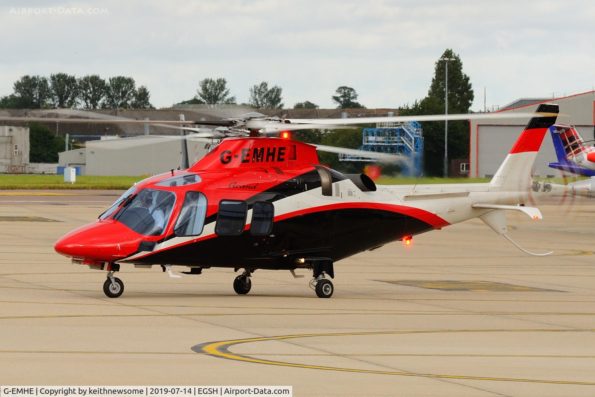 G-EMHE, 2011 Agusta A-109S Grand C/N 22182, Leaving Norwich.
