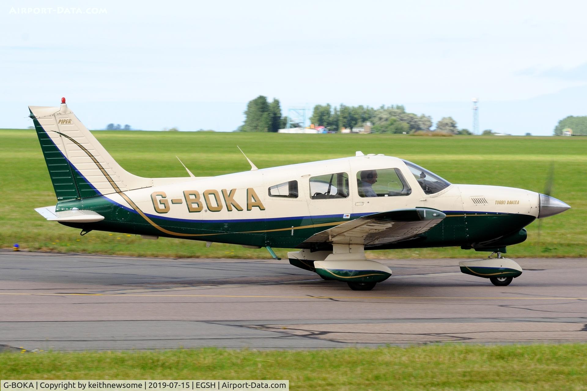 G-BOKA, 1979 Piper PA-28-201T Turbo Dakota C/N 28-7921076, Leaving Norwich.