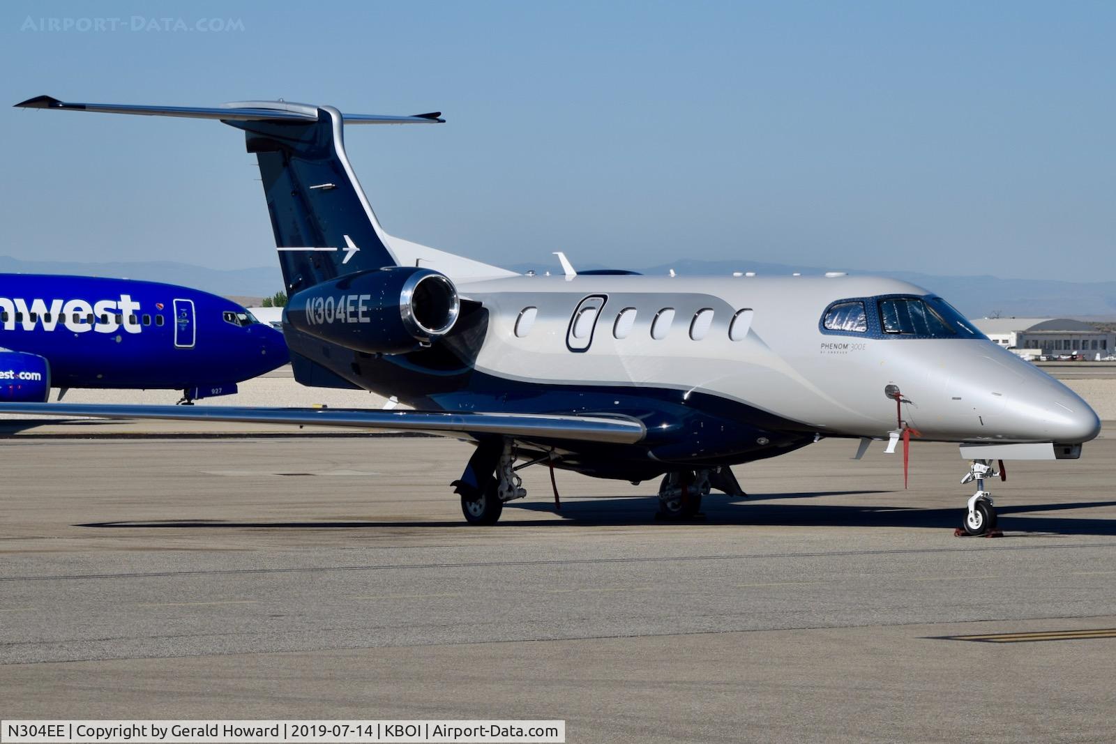 N304EE, 2019 Embraer EMB-505 Phenom 300 C/N 50500504, Parked on the north GA ramp.