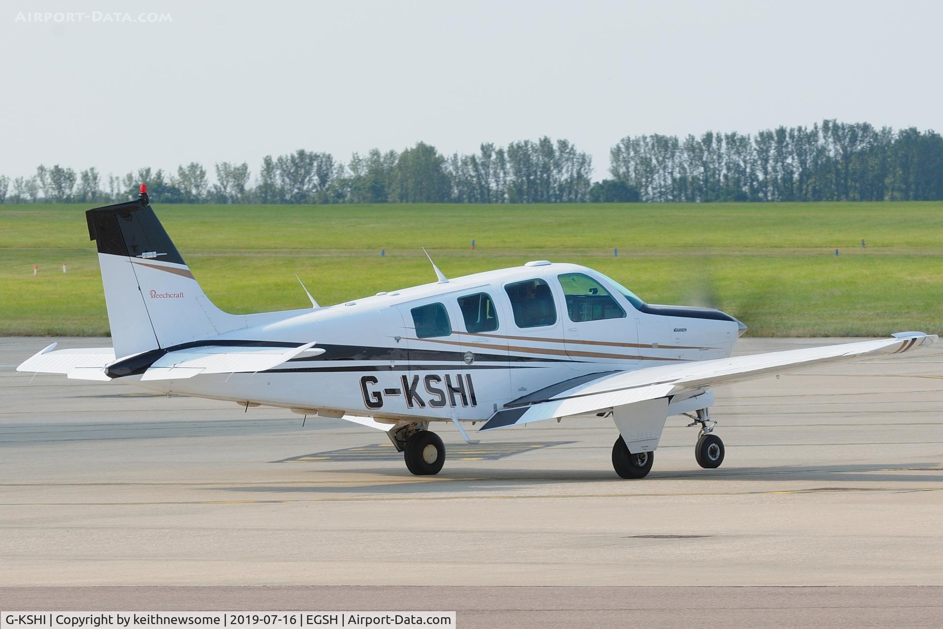 G-KSHI, 1987 Beechcraft A36 Bonanza C/N E-2353, Nice visitor, leaving Norwich.