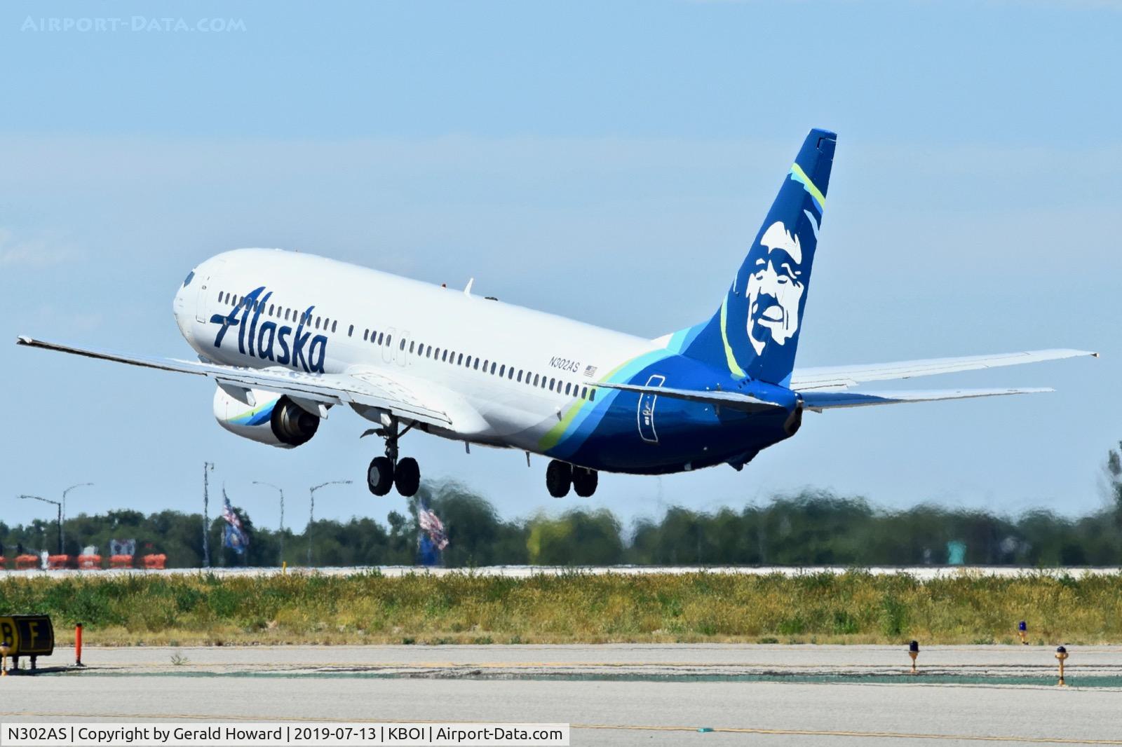 N302AS, 2003 Boeing 737-990 C/N 30017, Take off from RWY 28L.