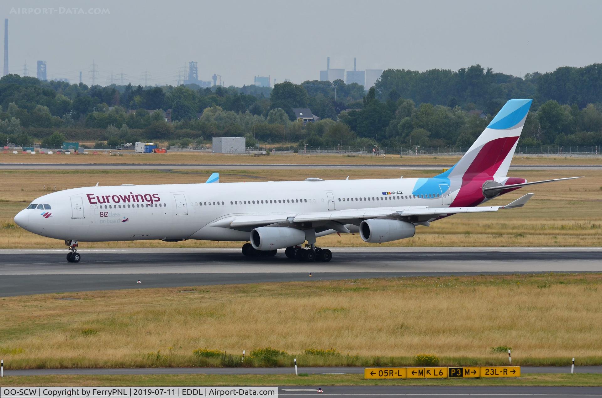 OO-SCW, 2000 Airbus A340-313 C/N 335, Eurowings A343 vacating the runway.