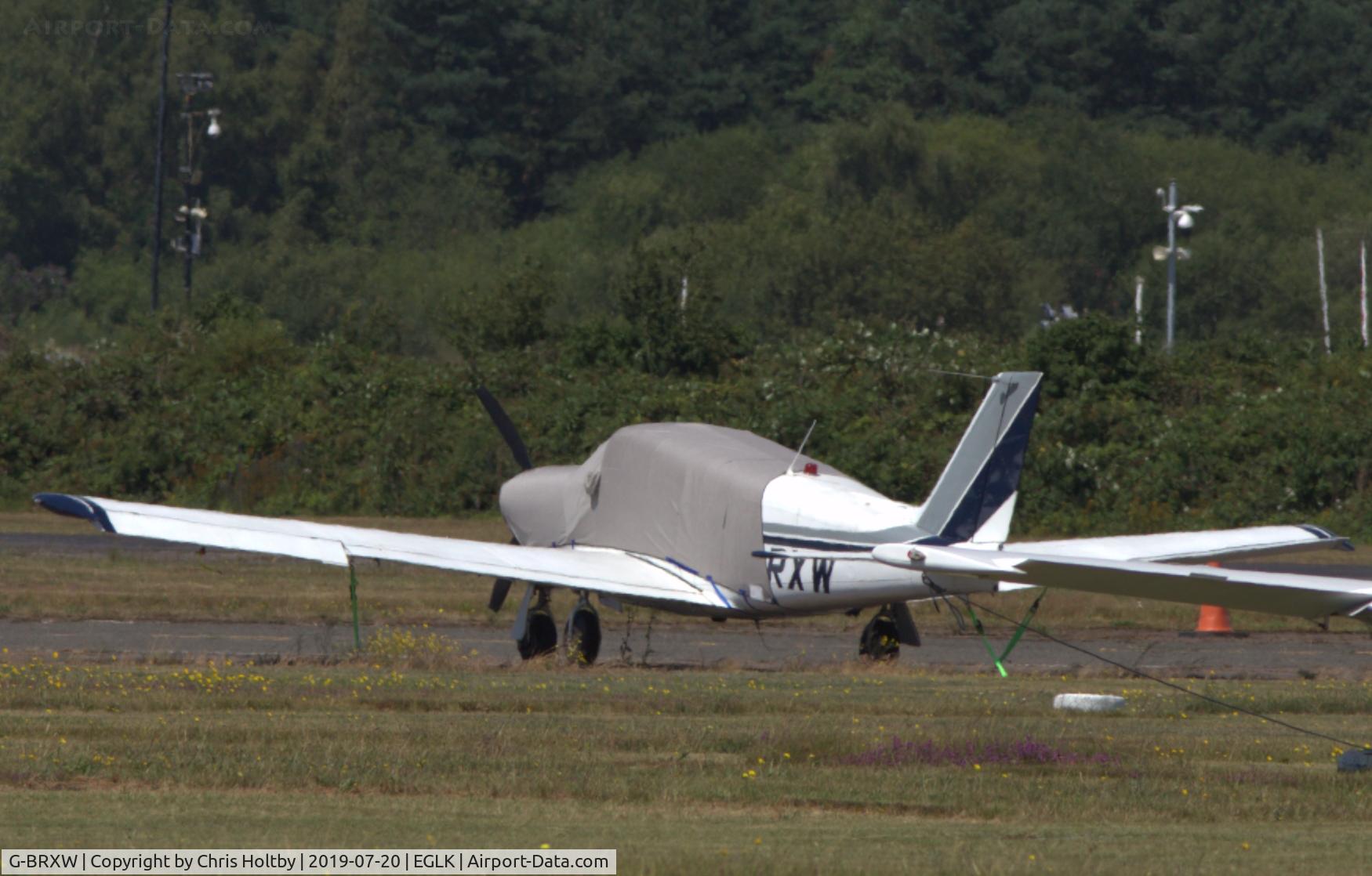 G-BRXW, 1964 Piper PA-24-260 Comanche C/N 24-4069, Freshened up in new livery and parked at Blackbushe