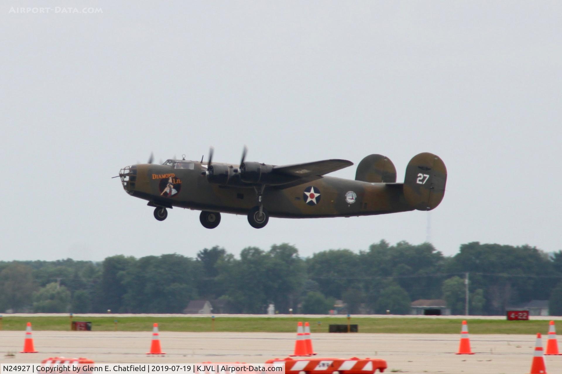 N24927, 1940 Consolidated Vultee RLB30 (B-24) C/N 18, Climbing out on departure