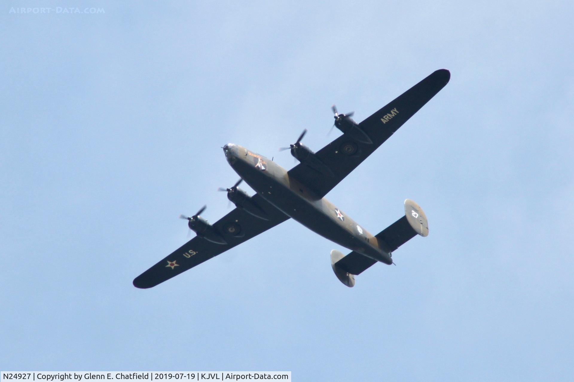 N24927, 1940 Consolidated Vultee RLB30 (B-24) C/N 18, Flying over the airport