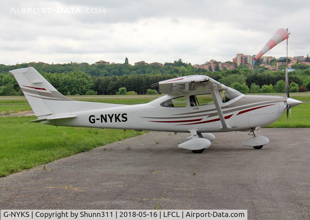 G-NYKS, 2005 Cessna 182T Skylane Skylane C/N 182-81607, Parked in the grass...