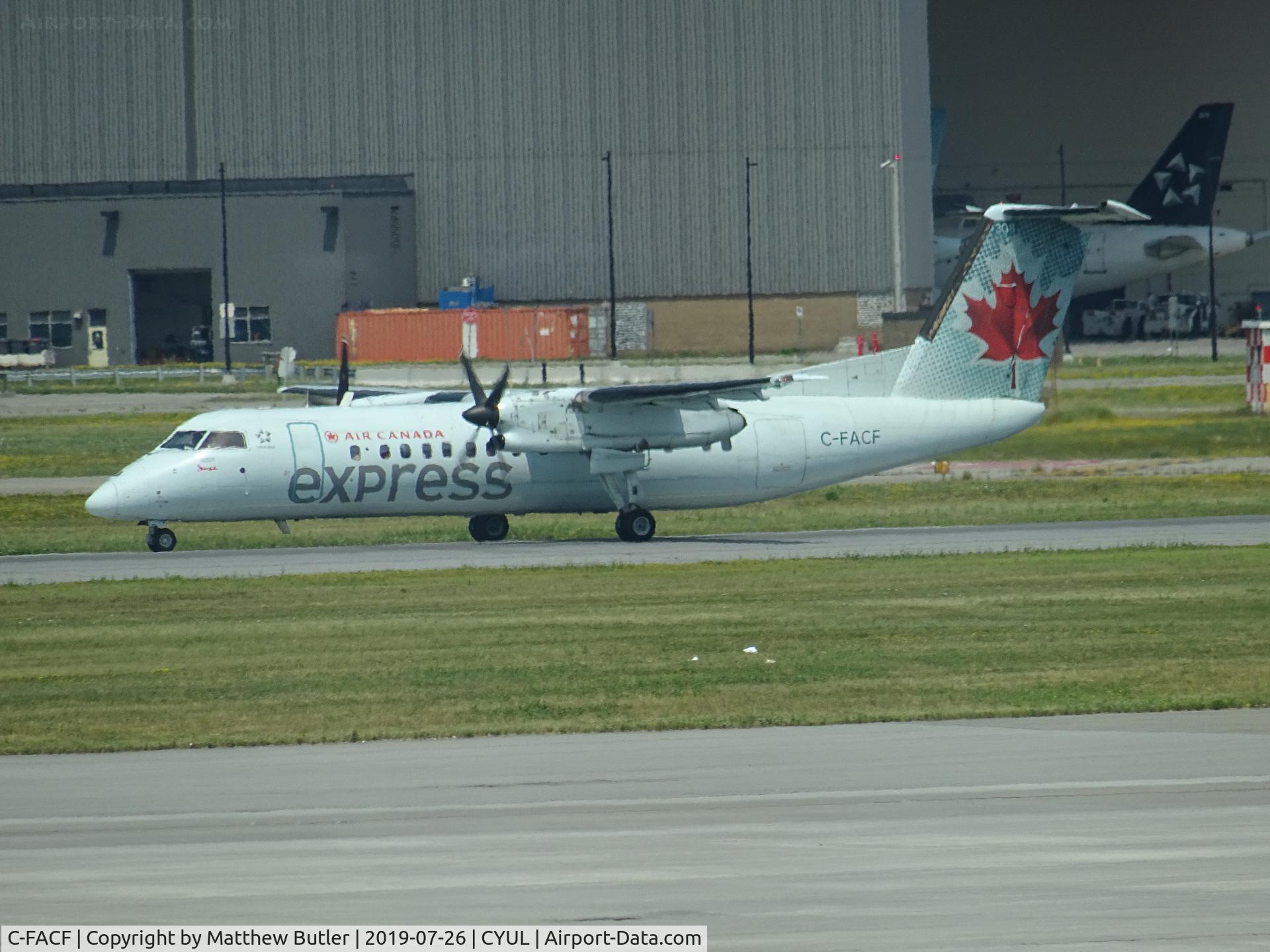 C-FACF, 1991 De Havilland Canada DHC-8-311 Dash 8 C/N 259, Taxiing at YUL