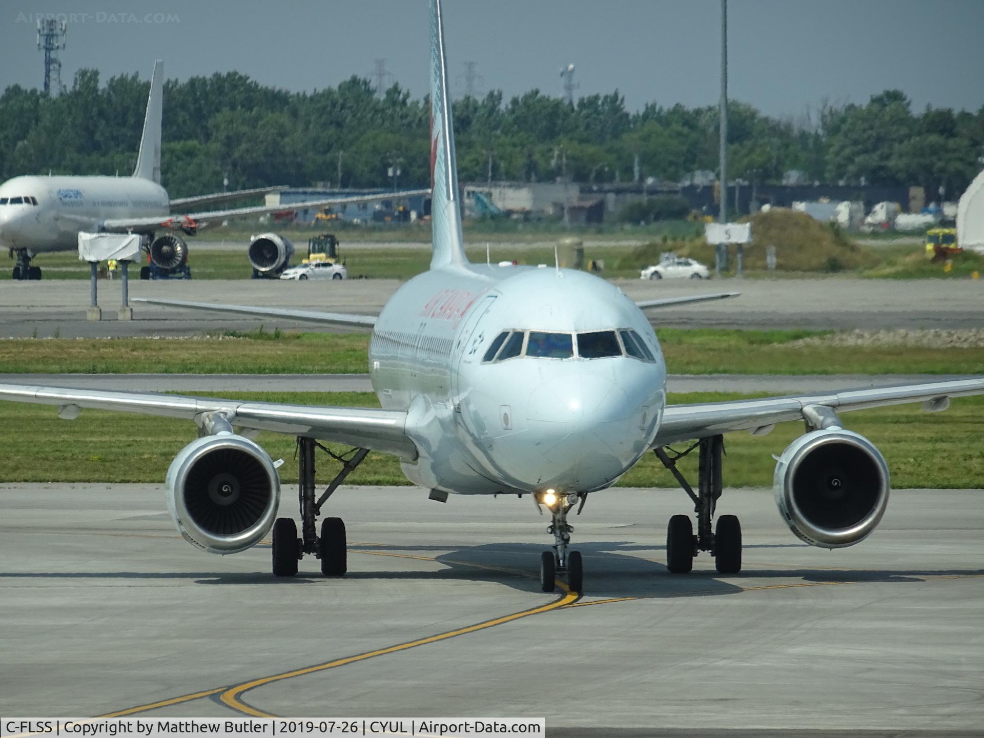 C-FLSS, 1992 Airbus A320-211 C/N 284, Taxiing to gate at YUL