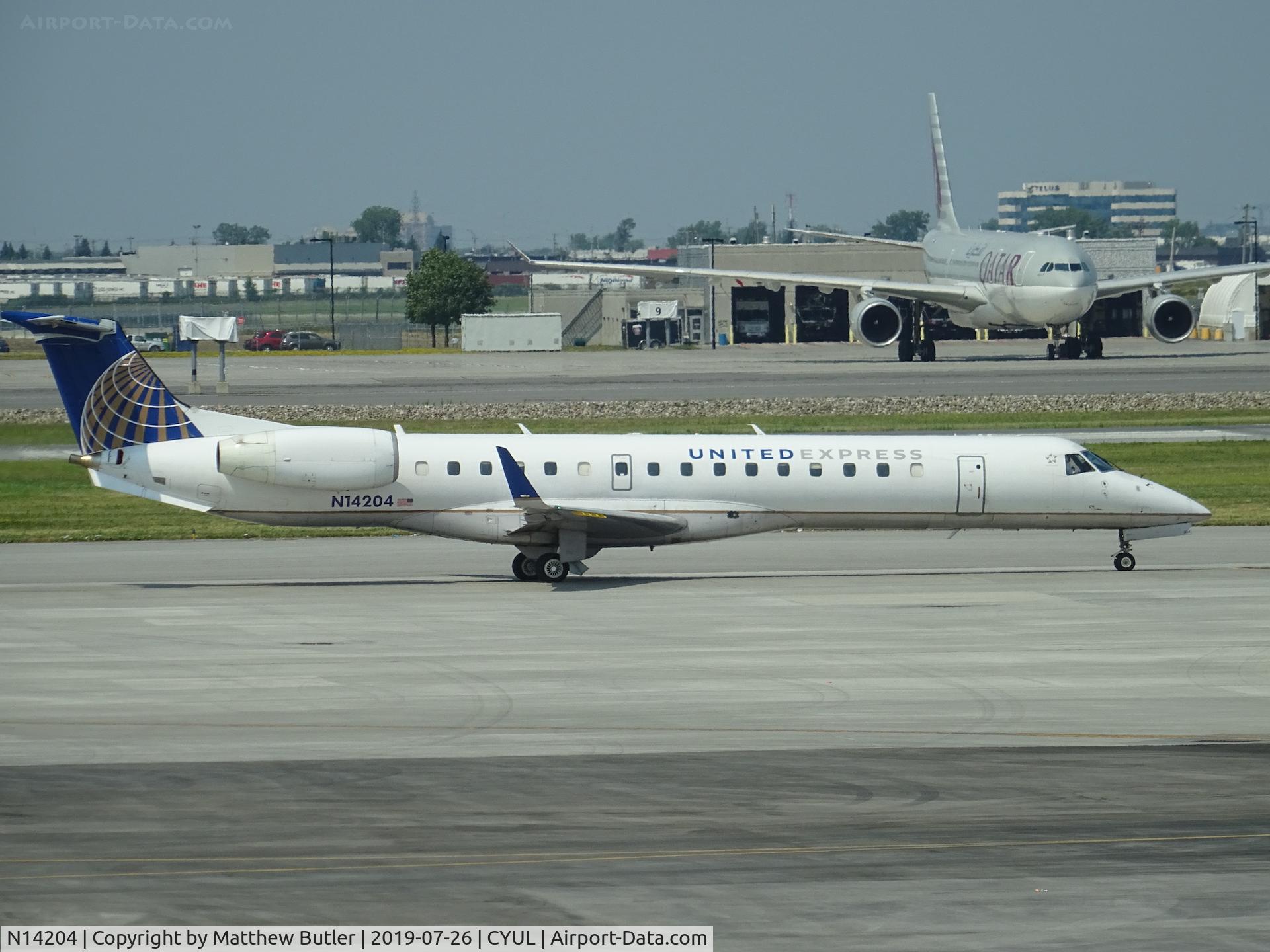 N14204, 2006 Embraer ERJ-145XR (EMB-145XR) C/N 14500968, Taxiing at CYUL