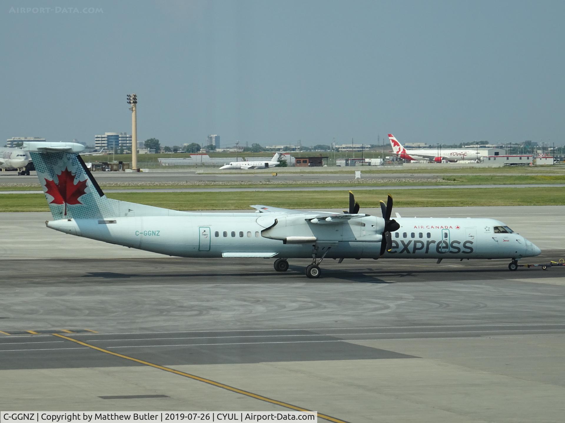 C-GGNZ, 2011 De Havilland Canada DHC-8-402Q Dash 8 C/N 4384, Towed at CYUL