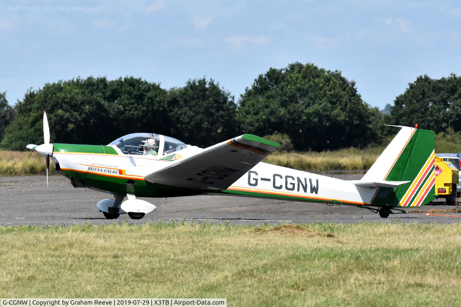 G-CGNW, 1996 Scheibe SF-25C Falke C/N 44615, Just landed at Tibenham.