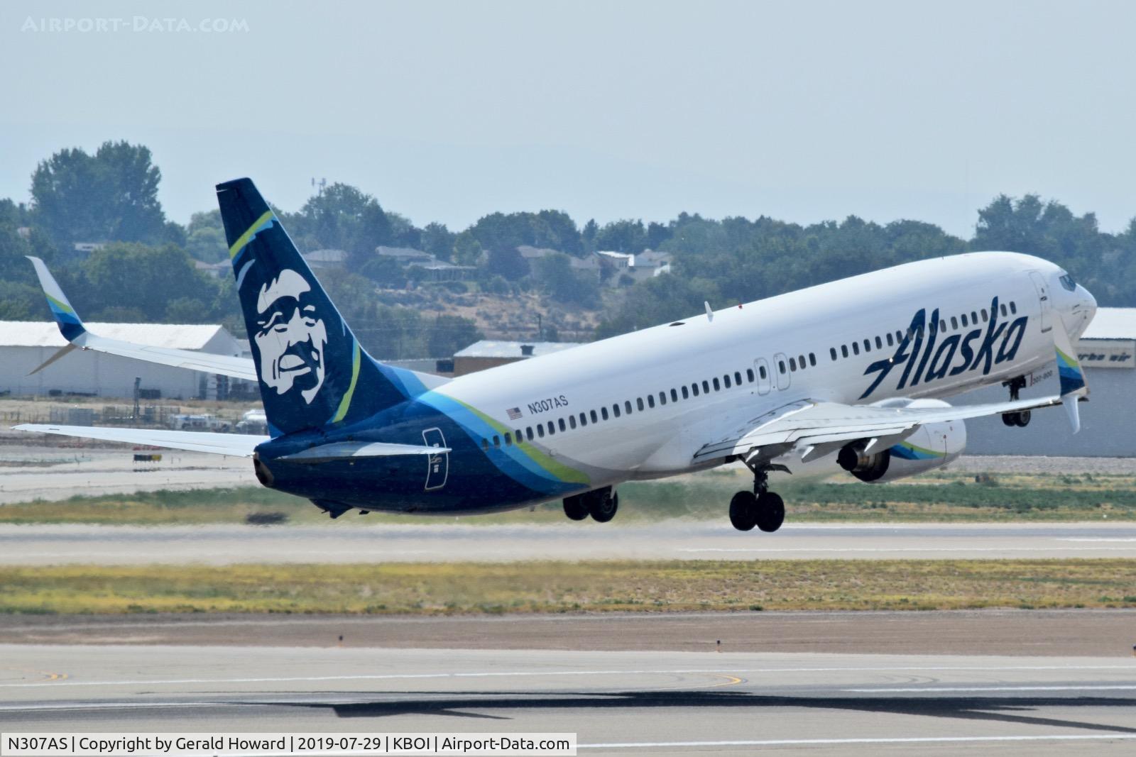 N307AS, 2001 Boeing 737-990 C/N 30015, Take off from RWY 28R.