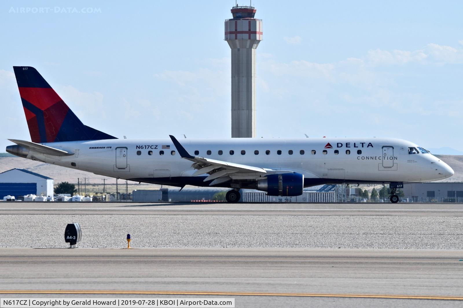 N617CZ, 2008 Embraer 175LR (ERJ-170-200LR) C/N 17000210, Landing roll out on RWY 28R.