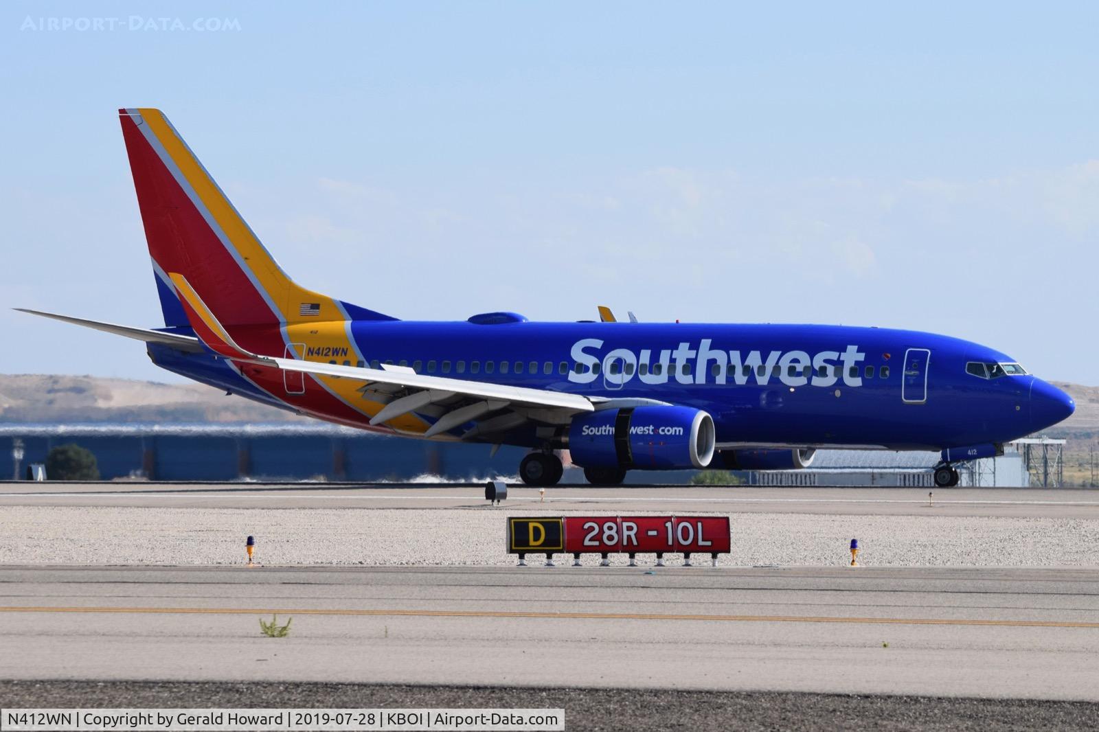 N412WN, 2001 Boeing 737-7H4 C/N 29818, Landing roll out on RWY 28R.