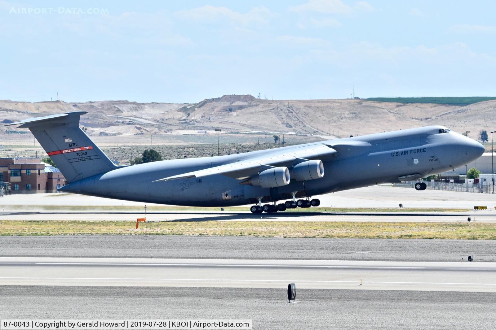 87-0043, 1988 Lockheed C-5M Super Galaxy C/N 500-129, Take off from RWY 28L. 439th Airlift Wing 