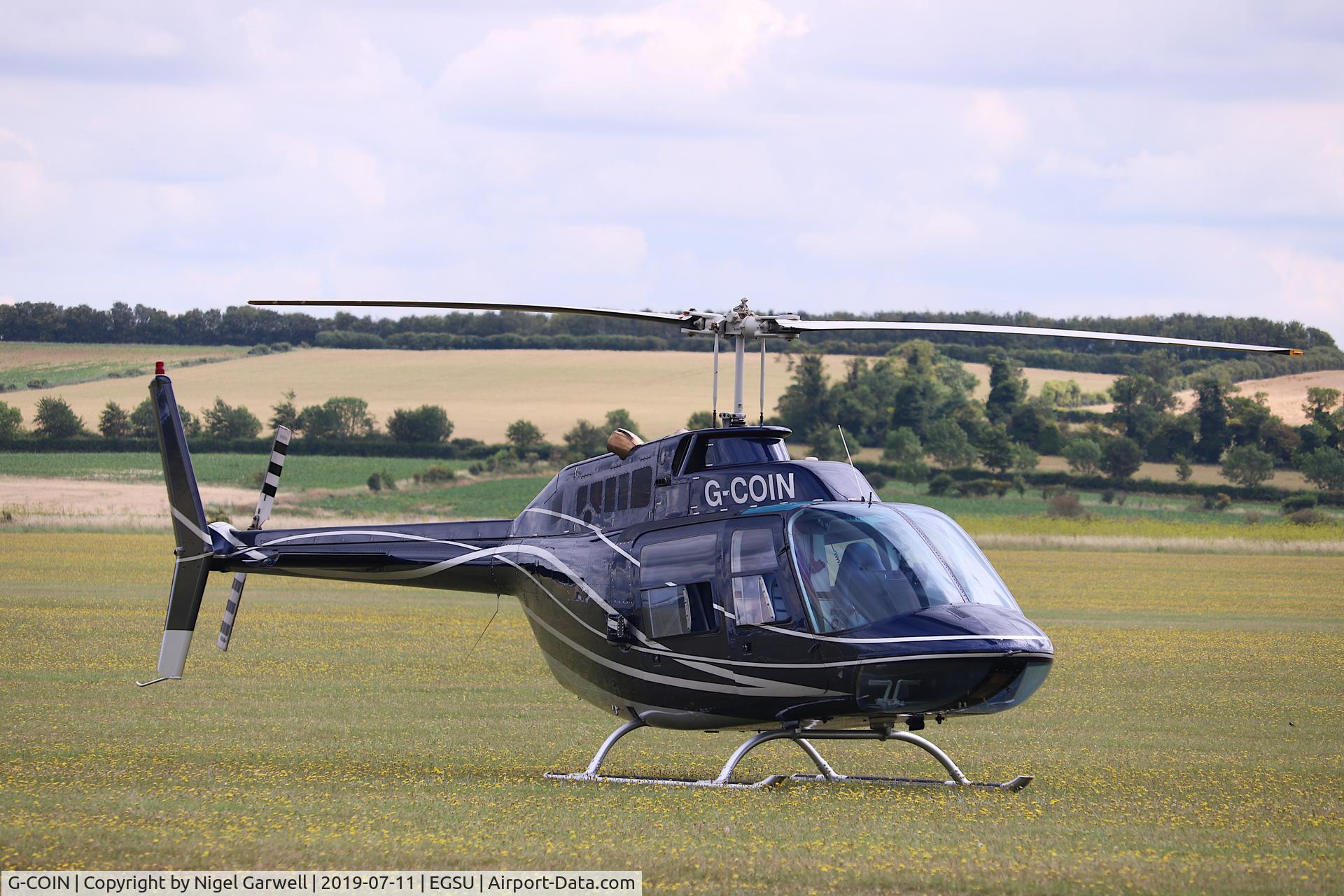 G-COIN, 1972 Bell 206B JetRanger II C/N 897, Flew in, parked for a while, flew out. Love the paint job!
