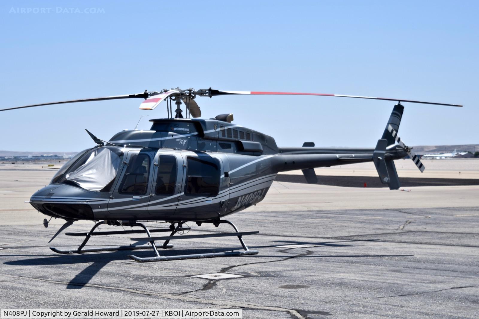 N408PJ, 1998 Bell 407 C/N 53286, Parked on the north GA ramp.