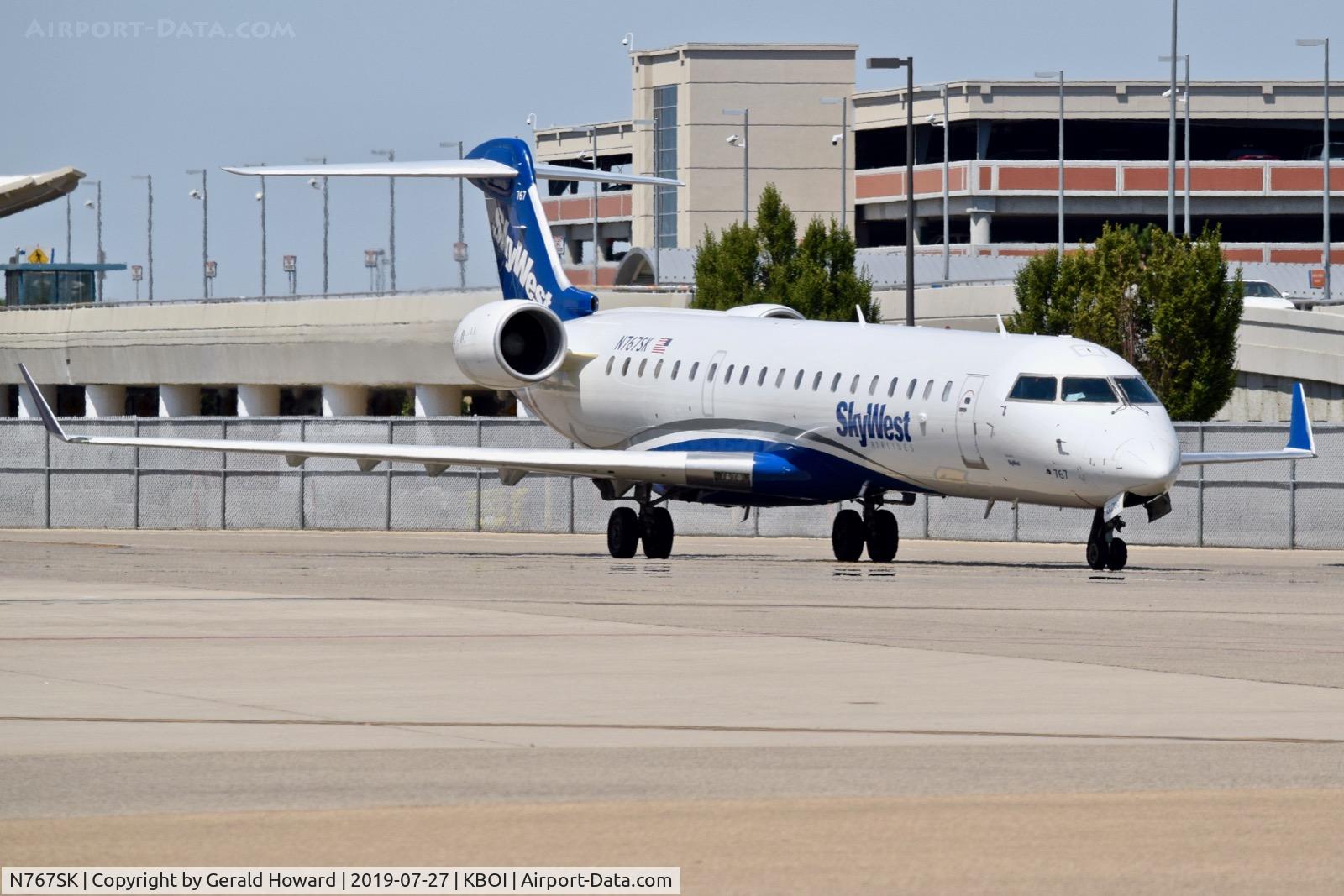 N767SK, 2005 Bombardier CRJ-702 (CL-600-2C10) Regional Jet C/N 10233, Leaving the gate.