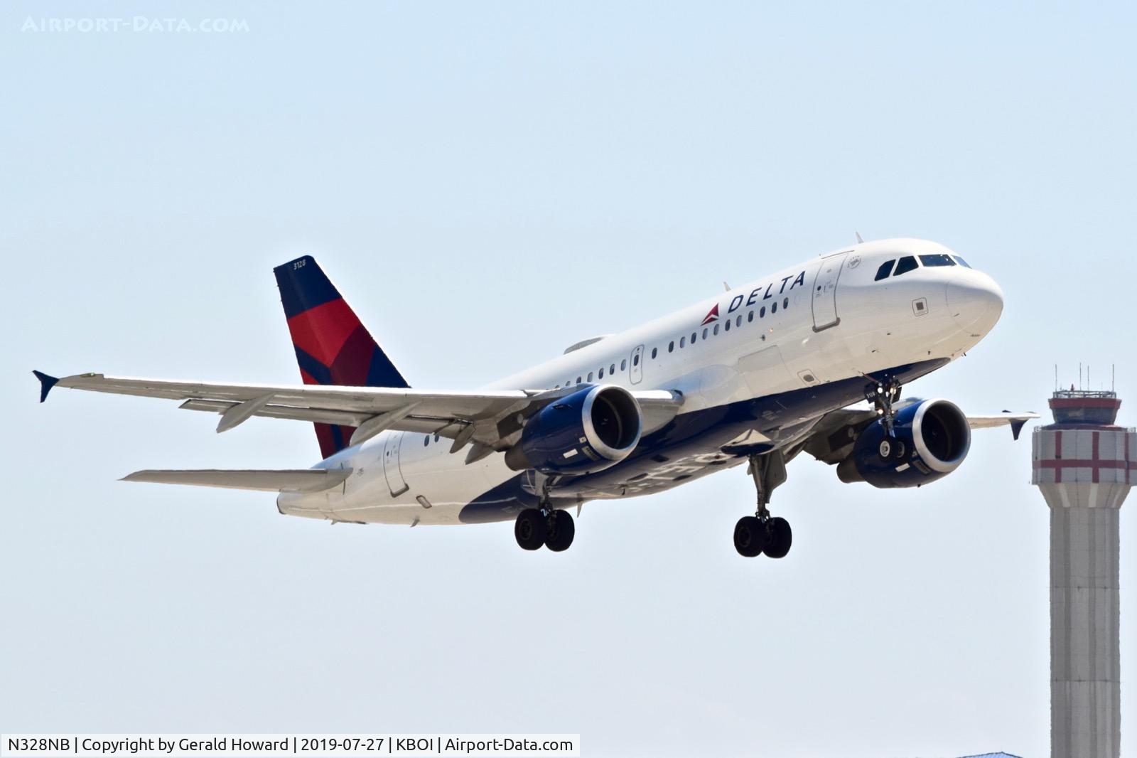N328NB, 2001 Airbus A319-114 C/N 1520, Climb out from RWY 28R.